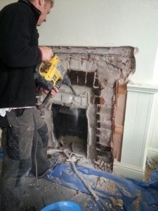 Enlarging a fireplace to the builder's opening for a wood burning stove